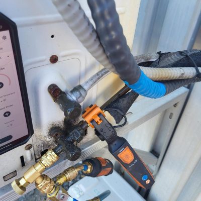 Residential AC maintenance and refrigerant pressure check in Edmonton Alberta
