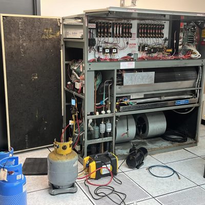 Commercial HVAC maintenance technician working in Edmonton